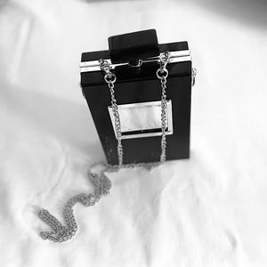 Cute& small black and gold purse/clutch